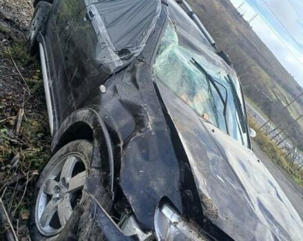 Черный Мицубиси Аутлендер, объемом двигателя 2.38 л и пробегом 270 тыс. км за 1700 $, фото 4 на Automoto.ua