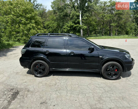 Мицубиси Аутлендер 2008 в Днепре (Днепропетровске) на Automoto.ua Черный Мицубиси Аутлендер, объемом двигателя 2.38 л и пробегом 320 тыс. км за 7500 $, фото 3 на Automoto.ua