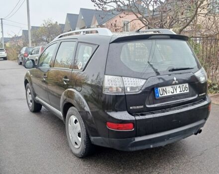 Черный Мицубиси Аутлендер, объемом двигателя 2 л и пробегом 226 тыс. км за 4700 $, фото 3 на Automoto.ua