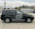 Міцубісі Аутлендер 2008 у Кременчуге на Automoto.ua Чорний Міцубісі Аутлендер, об'ємом двигуна 2.4 л та пробігом 230 тис. км за 6850 $, фото 5 на Automoto.ua
