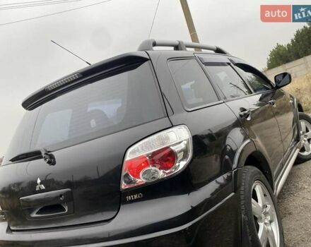 Черный Мицубиси Аутлендер, объемом двигателя 2.4 л и пробегом 178 тыс. км за 6900 $, фото 16 на Automoto.ua