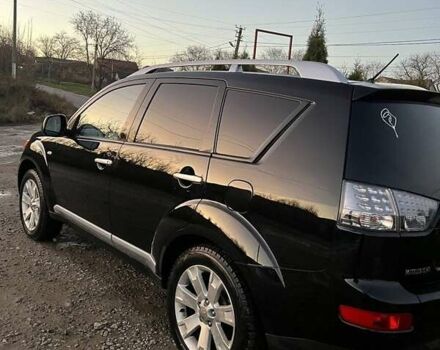 Черный Мицубиси Аутлендер, объемом двигателя 2.2 л и пробегом 310 тыс. км за 9700 $, фото 13 на Automoto.ua