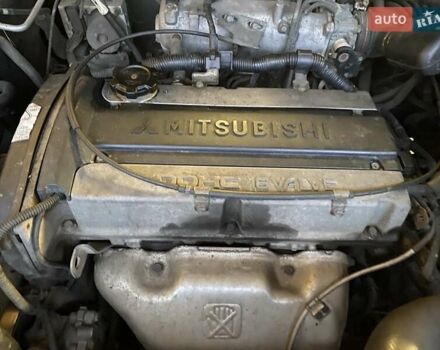 Черный Мицубиси Аутлендер, объемом двигателя 2 л и пробегом 306 тыс. км за 6500 $, фото 24 на Automoto.ua