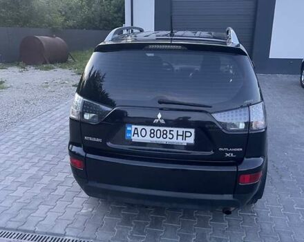 Черный Мицубиси Аутлендер, объемом двигателя 2.4 л и пробегом 290 тыс. км за 9500 $, фото 16 на Automoto.ua