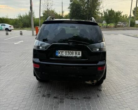 Черный Мицубиси Аутлендер, объемом двигателя 2.4 л и пробегом 369 тыс. км за 8500 $, фото 3 на Automoto.ua