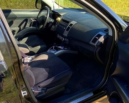 Черный Мицубиси Аутлендер, объемом двигателя 2.4 л и пробегом 217 тыс. км за 7300 $, фото 8 на Automoto.ua