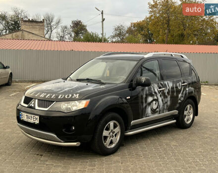 Черный Мицубиси Аутлендер, объемом двигателя 2.4 л и пробегом 230 тыс. км за 6650 $, фото 5 на Automoto.ua