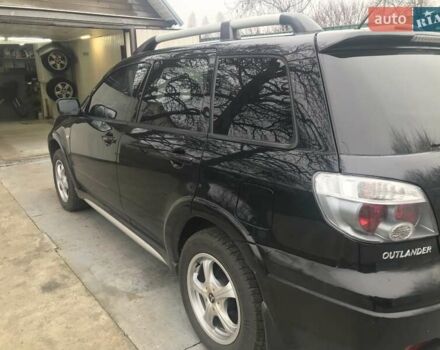 Чорний Міцубісі Аутлендер, об'ємом двигуна 2.38 л та пробігом 207 тис. км за 7000 $, фото 3 на Automoto.ua