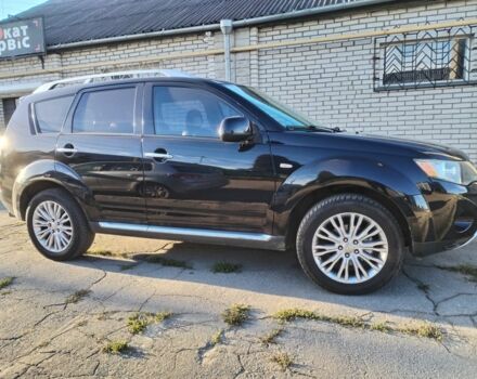 Черный Мицубиси Аутлендер, объемом двигателя 2.4 л и пробегом 199 тыс. км за 9000 $, фото 2 на Automoto.ua