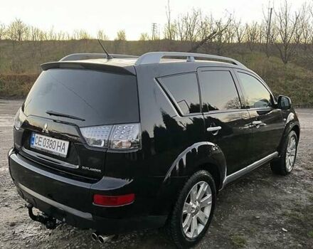 Черный Мицубиси Аутлендер, объемом двигателя 2.2 л и пробегом 310 тыс. км за 9700 $, фото 3 на Automoto.ua