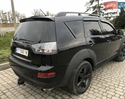 Чорний Міцубісі Аутлендер, об'ємом двигуна 2.4 л та пробігом 199 тис. км за 8999 $, фото 5 на Automoto.ua