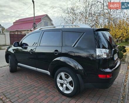 Черный Мицубиси Аутлендер, объемом двигателя 2.36 л и пробегом 192 тыс. км за 8800 $, фото 13 на Automoto.ua