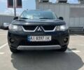 Чорний Міцубісі Аутлендер, об'ємом двигуна 2.4 л та пробігом 137 тис. км за 8999 $, фото 1 на Automoto.ua
