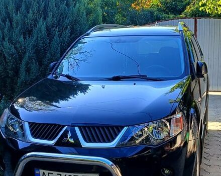 Черный Мицубиси Аутлендер, объемом двигателя 2.4 л и пробегом 184 тыс. км за 7500 $, фото 1 на Automoto.ua