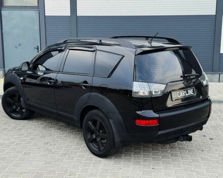 Черный Мицубиси Аутлендер, объемом двигателя 2.4 л и пробегом 199 тыс. км за 6470 $, фото 2 на Automoto.ua