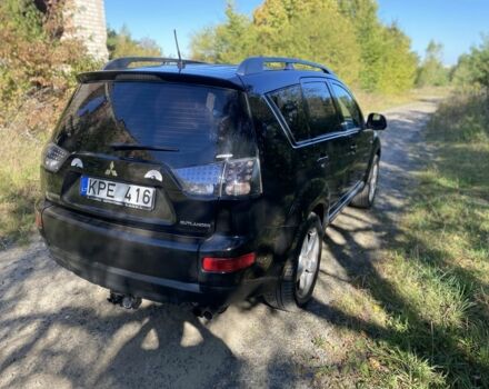 Чорний Міцубісі Аутлендер, об'ємом двигуна 2 л та пробігом 350 тис. км за 4100 $, фото 4 на Automoto.ua
