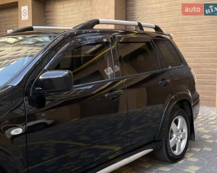 Черный Мицубиси Аутлендер, объемом двигателя 2 л и пробегом 270 тыс. км за 7199 $, фото 7 на Automoto.ua