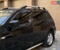 Черный Мицубиси Аутлендер, объемом двигателя 2 л и пробегом 270 тыс. км за 7199 $, фото 7 на Automoto.ua