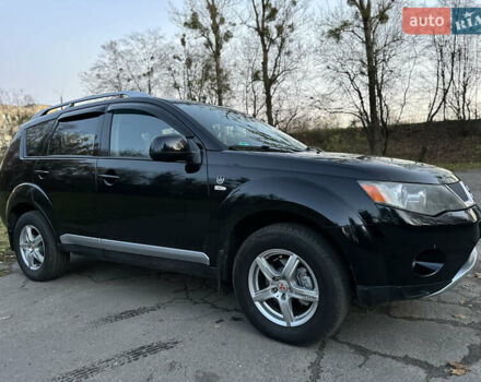 Чорний Міцубісі Аутлендер, об'ємом двигуна 1.97 л та пробігом 300 тис. км за 8600 $, фото 2 на Automoto.ua