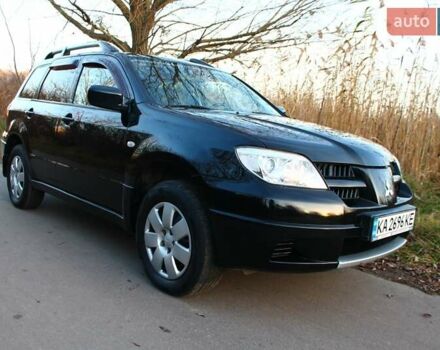 Черный Мицубиси Аутлендер, объемом двигателя 2 л и пробегом 189 тыс. км за 7200 $, фото 17 на Automoto.ua