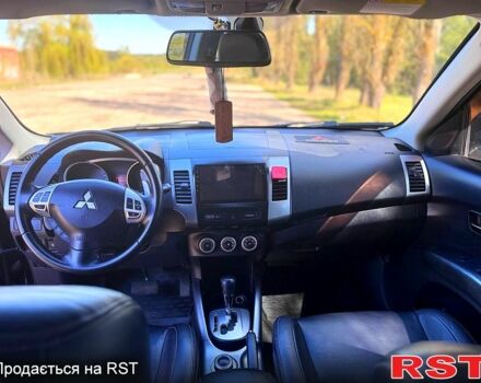 Черный Мицубиси Аутлендер, объемом двигателя 2.4 л и пробегом 208 тыс. км за 10200 $, фото 7 на Automoto.ua