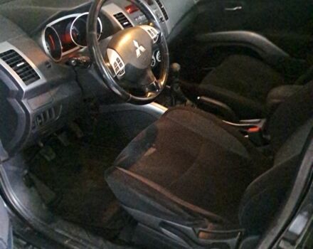 Черный Мицубиси Аутлендер, объемом двигателя 2 л и пробегом 226 тыс. км за 4700 $, фото 7 на Automoto.ua