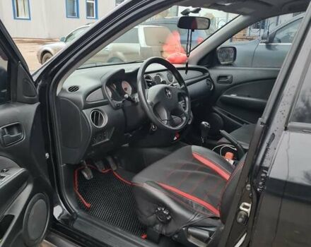 Черный Мицубиси Аутлендер, объемом двигателя 2 л и пробегом 212 тыс. км за 7900 $, фото 3 на Automoto.ua