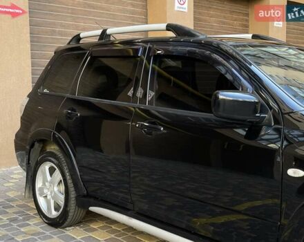 Черный Мицубиси Аутлендер, объемом двигателя 2 л и пробегом 270 тыс. км за 7199 $, фото 9 на Automoto.ua