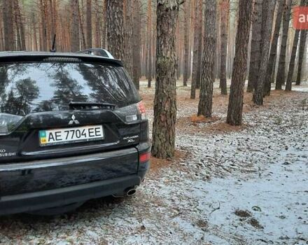 Черный Мицубиси Аутлендер, объемом двигателя 2.4 л и пробегом 228 тыс. км за 10400 $, фото 4 на Automoto.ua