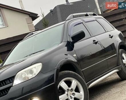 Черный Мицубиси Аутлендер, объемом двигателя 2.4 л и пробегом 178 тыс. км за 6900 $, фото 10 на Automoto.ua