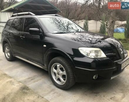 Чорний Міцубісі Аутлендер, об'ємом двигуна 2.38 л та пробігом 207 тис. км за 7000 $, фото 15 на Automoto.ua