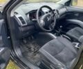 Черный Мицубиси Аутлендер, объемом двигателя 2 л и пробегом 320 тыс. км за 4200 $, фото 7 на Automoto.ua