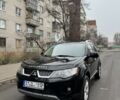 Черный Мицубиси Аутлендер, объемом двигателя 2 л и пробегом 377 тыс. км за 5200 $, фото 1 на Automoto.ua