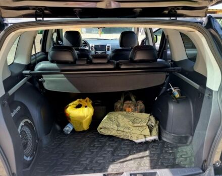 Черный Мицубиси Аутлендер, объемом двигателя 2.4 л и пробегом 234 тыс. км за 9800 $, фото 5 на Automoto.ua