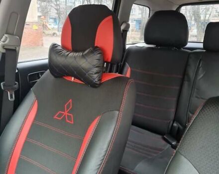 Черный Мицубиси Аутлендер, объемом двигателя 2 л и пробегом 212 тыс. км за 7900 $, фото 9 на Automoto.ua