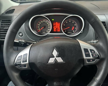 Черный Мицубиси Аутлендер, объемом двигателя 2.4 л и пробегом 199 тыс. км за 8777 $, фото 13 на Automoto.ua