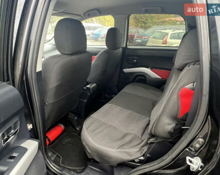 Черный Мицубиси Аутлендер, объемом двигателя 2.4 л и пробегом 230 тыс. км за 6650 $, фото 43 на Automoto.ua