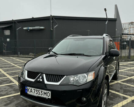 Черный Мицубиси Аутлендер, объемом двигателя 2.36 л и пробегом 120 тыс. км за 10100 $, фото 2 на Automoto.ua