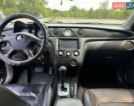 Мицубиси Аутлендер 2008 в Днепре (Днепропетровске) на Automoto.ua Черный Мицубиси Аутлендер, объемом двигателя 2.38 л и пробегом 320 тыс. км за 7500 $, фото 11 на Automoto.ua