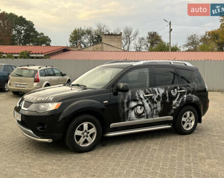 Черный Мицубиси Аутлендер, объемом двигателя 2.4 л и пробегом 230 тыс. км за 6650 $, фото 6 на Automoto.ua