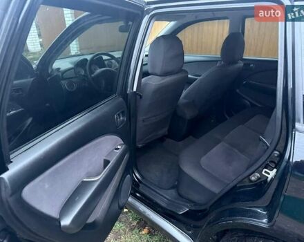 Черный Мицубиси Аутлендер, объемом двигателя 2 л и пробегом 232 тыс. км за 7000 $, фото 10 на Automoto.ua