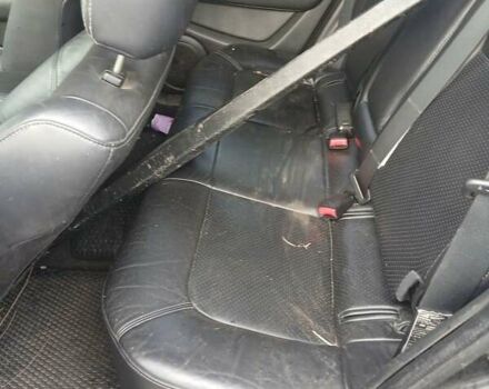 Черный Мицубиси Аутлендер, объемом двигателя 2.38 л и пробегом 270 тыс. км за 1700 $, фото 1 на Automoto.ua