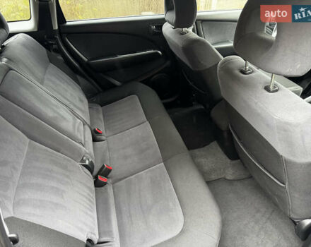Чорний Міцубісі Аутлендер, об'ємом двигуна 2 л та пробігом 254 тис. км за 7499 $, фото 11 на Automoto.ua