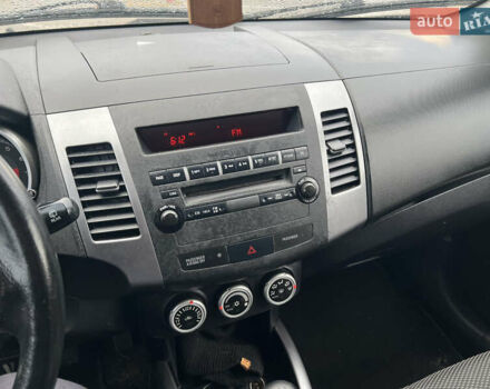 Черный Мицубиси Аутлендер, объемом двигателя 2.4 л и пробегом 230 тыс. км за 6650 $, фото 34 на Automoto.ua