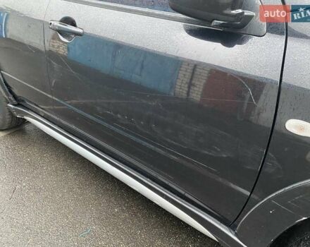 Черный Мицубиси Аутлендер, объемом двигателя 2 л и пробегом 306 тыс. км за 6500 $, фото 21 на Automoto.ua