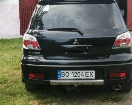 Чорний Міцубісі Аутлендер, об'ємом двигуна 2 л та пробігом 208 тис. км за 6700 $, фото 7 на Automoto.ua