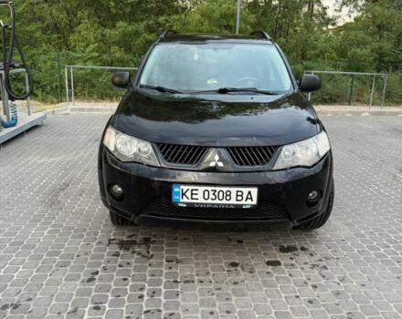 Черный Мицубиси Аутлендер, объемом двигателя 2.4 л и пробегом 369 тыс. км за 8500 $, фото 2 на Automoto.ua