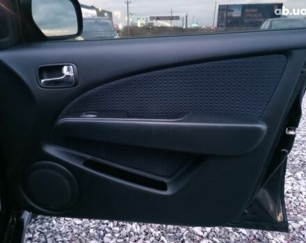 Черный Мицубиси Аутлендер, объемом двигателя 2 л и пробегом 271 тыс. км за 6940 $, фото 20 на Automoto.ua