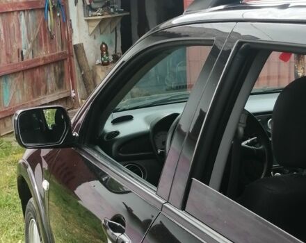 Чорний Міцубісі Аутлендер, об'ємом двигуна 2 л та пробігом 208 тис. км за 6700 $, фото 2 на Automoto.ua