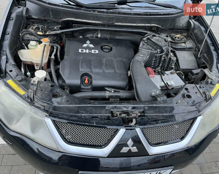 Черный Мицубиси Аутлендер, объемом двигателя 1.97 л и пробегом 244 тыс. км за 8700 $, фото 19 на Automoto.ua